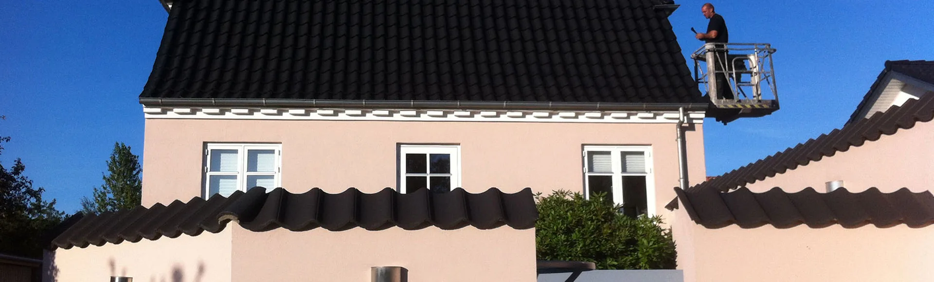Hus med rent tag efter algebehandling